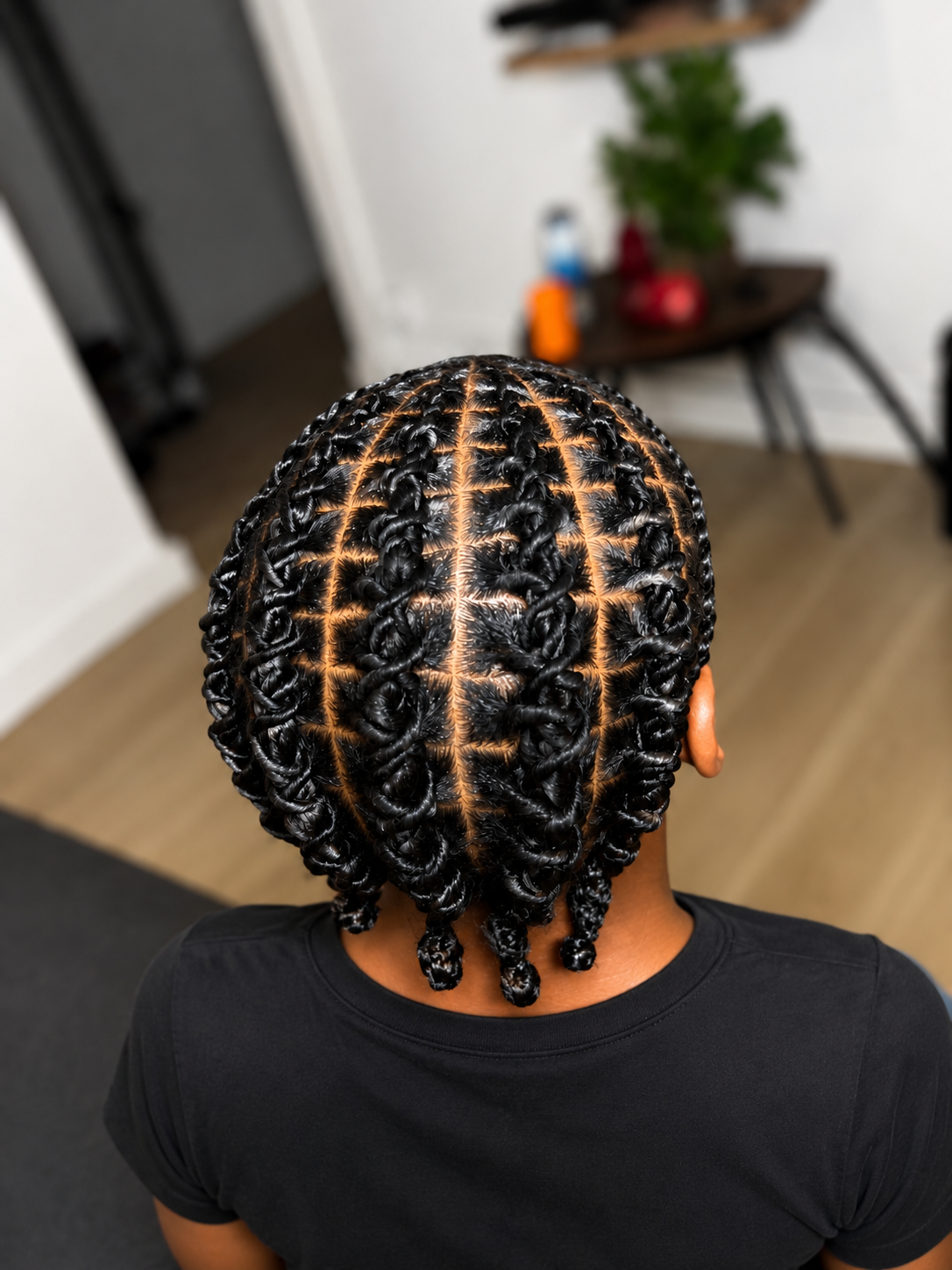 Twists et coiffure protectrice réalisée en salon